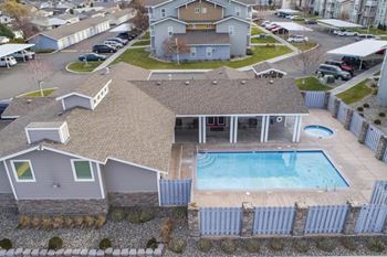 Swimming pool with hot tub and outside showers