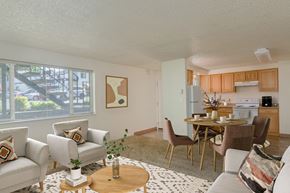 Corvallis apartment for rent - a living room with couches and chairs and a dining room table