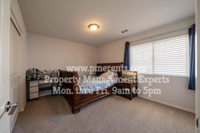 Stockton apartment for rent - a bedroom with a bed and a window