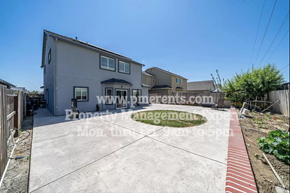 Stockton apartment for rent - an image of a house with a driveway in front of it