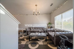 Stockton apartment for rent - a living room with a couch and a coffee table