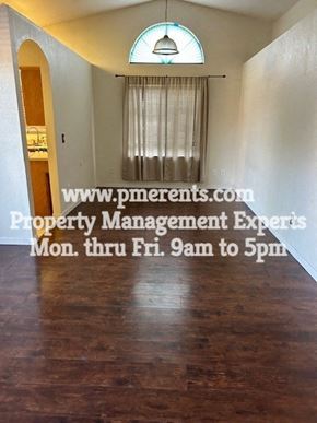 Stockton apartment for rent - a room with a wood floor and a window