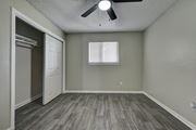 San Antonio apartment for rent - an empty bedroom with a closet and a ceiling fan at The Crossings at Montrose Apartments, San Antonio