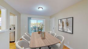 Overland Park apartment for rent - A dining room with a table and chairs.