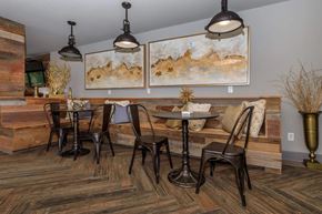 Kansas City apartment for rent - A dining room with a wooden table and chairs.