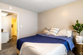 Grandview apartment for rent - a bedroom with a bed and a door to a bathroom