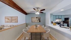 Lawrence townhouse for rent - A dining room with a table and chairs.