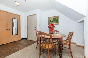 Lafayette apartment for rent - A dining room with a wooden table and chairs.