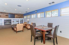 West Lafayette apartment for rent - A dining room with a wooden table and chairs.
