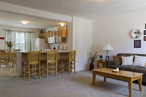 Bloomington apartment for rent - A dining room with a table and chairs.