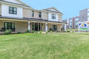 Bloomington apartment for rent - A house with a lawn in front of it.