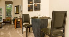 Houston apartment for rent - a dining room with a table and chairs