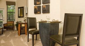 Houston apartment for rent - a dining room with a table and chairs