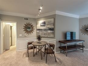 Houston apartment for rent - a dining room with a table and chairs