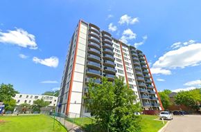 Toronto apartment for rent - an apartment building on the side of a street