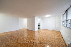 Scarborough apartment for rent - an empty living room with white walls and wood floors