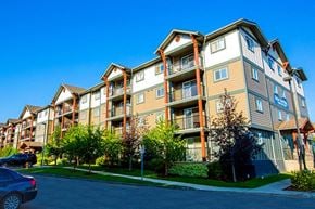 Edmonton apartment for rent - a row of apartment buildings on the side of a street