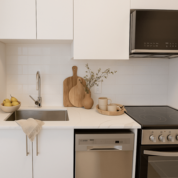 Ottawa apartment for rent - A kitchen with a stove, oven, and sink.