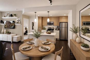 Hardwood-style flooring in main living areas and baths