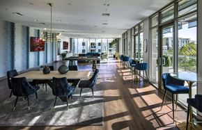 San Diego apartment for rent - A large dining room with a long table and chairs at Circa 37 Apartments, San Diego, California