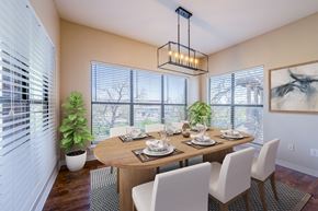 New Braunfels apartment for rent - Dining Room with Wooden Table at The Landmark, New Braunfels, TX