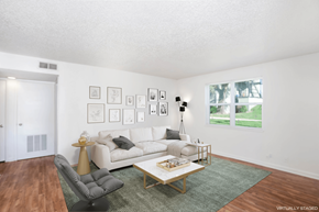 Madison apartment for rent - a living room with a couch and a coffee table