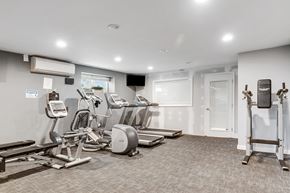 Philadelphia apartment for rent - A gym with treadmills, exercise bikes, and other equipment.