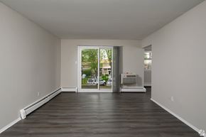 Feasterville-Trevose apartment for rent - A room with a sliding glass door leading to a balcony.