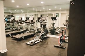 Greensboro apartment for rent - a row of exercise bikes in a gym