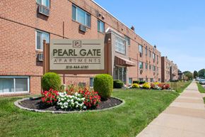 Philadelphia apartment for rent - A brick building with a sign that says Pearl Gate Apartments.