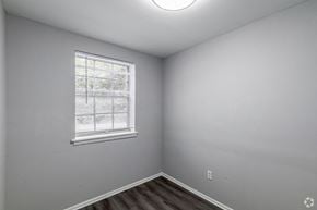 Wilmington apartment for rent - the living room of an empty house with a window