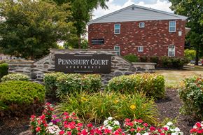 Morrisville apartment for rent - A brick building with a sign that says PENNSYLVANIA COURT.