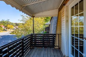 Madison apartment for rent - a balcony with a view of a street and trees