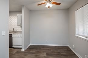 Madison apartment for rent - A room with a ceiling fan and a washing machine.