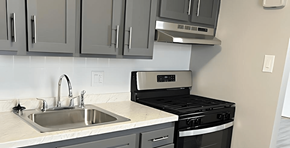 Philadelphia apartment for rent - A kitchen with a sink, stove, and oven.