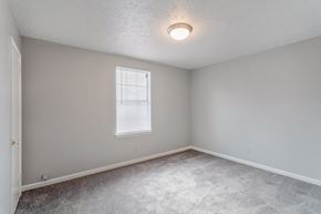 Madison apartment for rent - A room with a window and a carpeted floor.