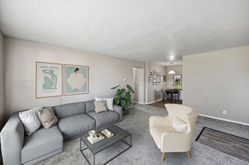 A living room with a couch and a coffee table