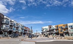 Louisville apartment for rent - City street with buildings at Delo Apartments, Louisville, CO, Colorado