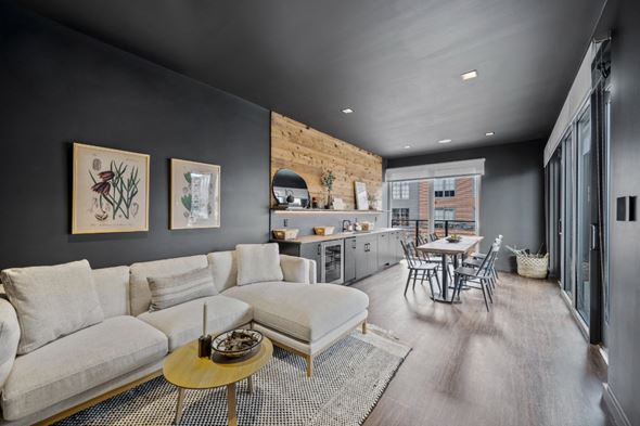 New Haven apartment for rent - a living room with a couch and a table and a kitchen at The Audubon New Haven, New Haven, CT