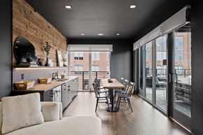 New Haven apartment for rent - a kitchen and dining area with a table and chairs and sliding glass doors at The Audubon New Haven, New Haven, CT, 06511