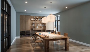 Westport apartment for rent - A modern dining room with a wooden table and chairs.