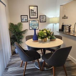 Seattle apartment for rent - A dining room with a round table and chairs.