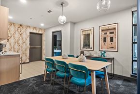 Seattle apartment for rent - A dining room with a table set for four.