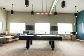 Kent apartment for rent - A room with a pool table and a television. at The Platform, Washington
