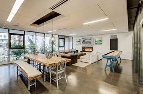 Seattle apartment for rent - A modern dining room with a wooden table and chairs.