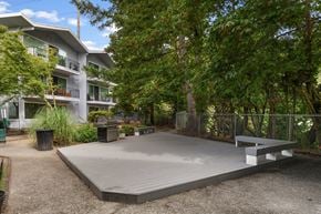 Issaquah apartment for rent - A playground area with a slide and a bench.
