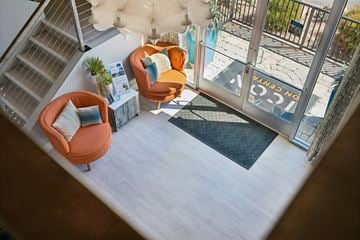 Phoenix apartment for rent - A living room with a couch and a chair.