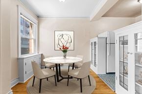 Seattle apartment for rent - A dining room with a white table and chairs.