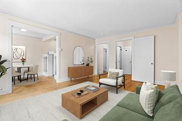 Seattle apartment for rent - A living room with a green couch and a coffee table.