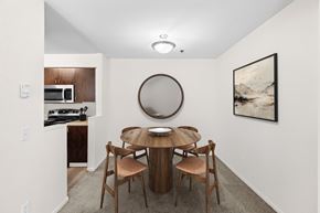 Kent apartment for rent - A dining room with a round table and chairs.